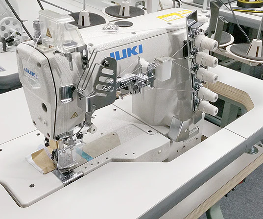 Industrial machines being cleaned and dried after flood in Sri Lanka
